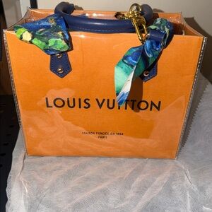 Louis Vuitton Vibrant Orange Tote with Blue Accents